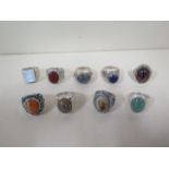 Nine heavy silver rings, with stones, some stamped 925 - but all tested as silver, total approx
