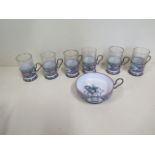 A set of six Persian or Islamic enameled coffee cups and a sugar bowl, two glass liners differ and