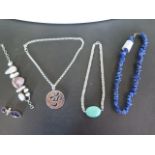 A collection of silver jewellery with turquoise, black onyx and amethyst, also a bracelet set with