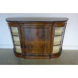 A superb Victorian figured walnut bow fronted credenza, fully restored, with ormulu beaded edges and