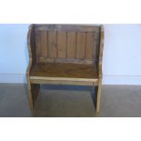 A small rustic pine pew - 80cm wide
