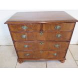 A well restored 18th century figured walnut chest with two short over three long drawers, on