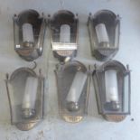 A set of six wall outside lights by Denhman Montrose Ltd - in working order, good condition apart