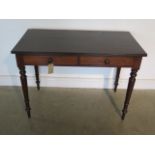 A Victorian mahogany side table with two frieze drawers, with a replaced top - 108cm W x 78cm H