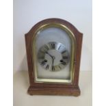 An 8 day oak case mantle clock, HAC movement, strikes hours/half - 29cm tall - working