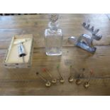 A boxed corkscrew with instructions, looks unused, reindeer nut crackers, glass decanter, probably