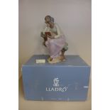A Lladro figure 'Poetic Moment' 12299 - boxed in good condition - previous shop RRP 445euros