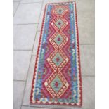 A vegetable dye wool Chobi Kilim runner 200x67cm