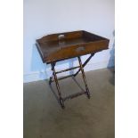 A restored 19th century oak butlers tray on stand