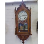 An oak case Gothic style 8 day striking wall clock, working - 96cm tall