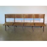 A good quality early four seater 20th century oak church bench which can fold flat, 210cm - in sound