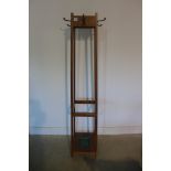 A 1940's oak hall stand - 173cm H x 35cm W