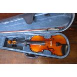 A modern ridgewood violin with case