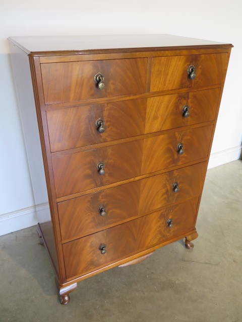 A 20th century mahogany chest of two over four graduated drawers, in good condition - 117cm H x 82cm