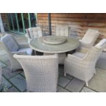 A Bramblecrest Oakridge 140cm round dining set, with lazy Susan, and six high back dining