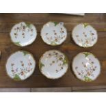 A set of six Limoges plates, in good condition - 22cm diameter
