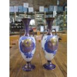 A pair of Doulton Burslem twin handled vases, 25cm tall, both in good condition