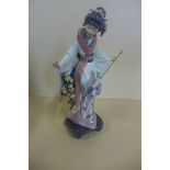 A Lladro Japanese girl 'Ternko' boxed, in good condition, minor foliate chip, previous shop RRP