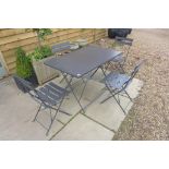 A metal folding garden table and four chairs in grey, ex-John Lewis