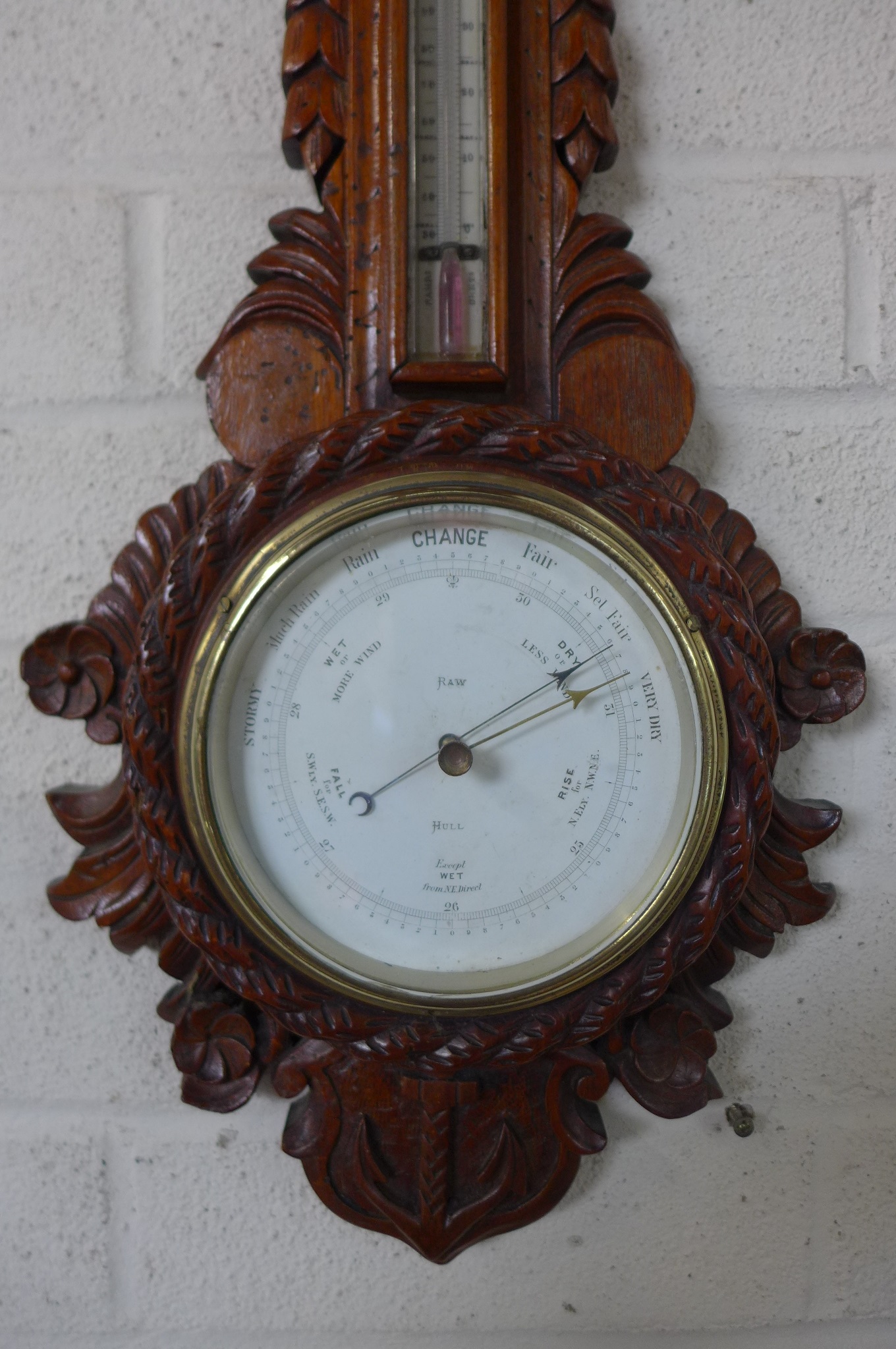 A late Victorian walnut barometer clock with thermometer, extensively carved with a nautical - Image 2 of 4