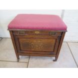 An Edwardian inlaid rosewood piano music stool with a fitted fall front, 52cm tall x 52cm x 34cm