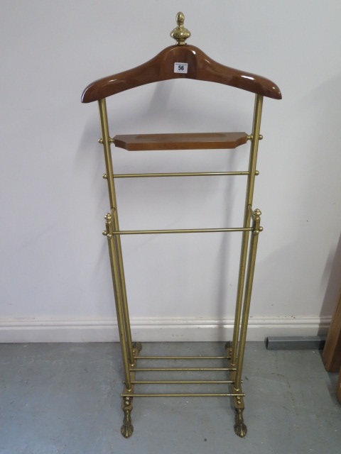 A wood and brass valet stand with hanger, tray and rails, width 49cm, height 125cm