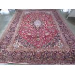A hand knotted woollen Najaf Abad rug, 347cm x 250cm