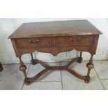 A walnut two drawer Queen Anne style side table, the top quartered and cross banded in figured