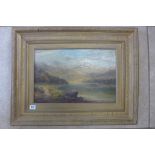 An oil on canvas, Scottish loch scene, signed Tom Seymour, in a gilt frame, 55x70 cm, some overall