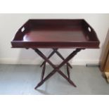 A Georgian style mahogany butlers tray on stand, the stand with turned supports, tray measures