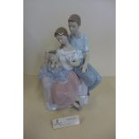A Lladro group 'A Circle of Love' 06986 - boxed, in good condition, previous shop RRP 520euros