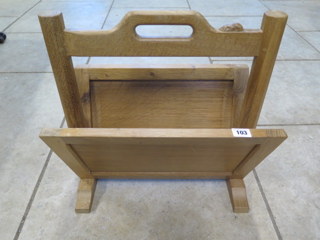 An oak magazine rack by Robert Mouseman Thompson of Kilburn with carved signature mouse - 46cm H x