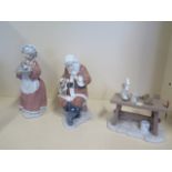 A Christmas group of Lladro figures, including Santa 6890, Santa's workbench 6892 and Mrs Santa 6893