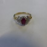 A hallmarked 9ct ruby and diamond ring, diamond 0.25ct, size P, approx 3 grams, generally good