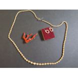 A collection of coral and pearl jewellery, including necklace - 73cm - brooch and earrings with