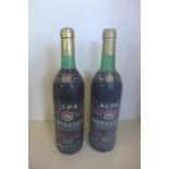 Two bottles of 1981 Valpolcella Bertani Amarones red wine - level to base of neck