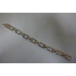 A Gucci silver bracelet, stamped Gucci Italy, length 23cm, weight approx 48 grams, surface marks