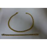 A 9ct gold necklace and bracelet set, flat wheat link style chain, fully hallmarked, length of