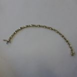A 9ct yellow gold and diamond bracelet, approx 10 grams, 18cm long - in generally good condition