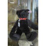 A Steiff Black Bear made in 2004 - limited to 3000 EAN 038150 - 32cm tall with box and certificate