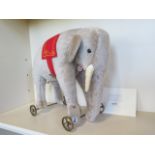 A Steiff large elephant on wheels 1903/04 replica, made in 2004 limited to 1000 - EAN 400407 with