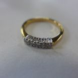 An 18ct yellow gold five stone diamond ring, size O, approx 3 grams - in generally good condition