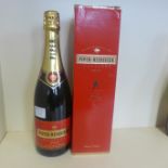 A bottle of Piper Heidsieck Champagne, Brut red label - boxed