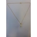 A hallmarked 9ct opal and diamond pendant on 9ct chain, marked 9KT, 44cm long, approx 2.9 grams,