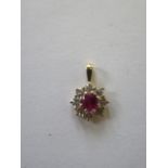 A hallmarked diamond and ruby pendant, 10mm wide, diamond approx 0.46ct, ruby approx 0.39ct - approx