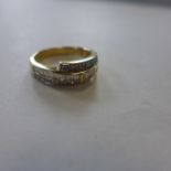An 18ct yellow gold and diamond ring, size O, approx 5.5 grams - in generally good condition