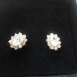 A pair of 9ct yellow gold cz earrings