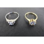 Two gold dress rings including a 14ct white gold ring, size N 1/2 set with white stones, approx