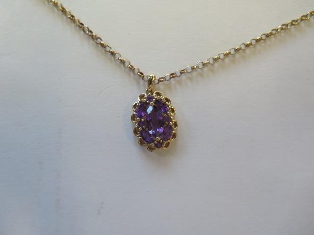 A 14ct yellow gold amethyst pendant on a modern 9ct chain, total weight approx 6 grams, pendant - Image 2 of 3