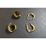Two pairs of 9ct gold hoop earrings, for pierced ears, weight approx 4.4 grams, marks consistent